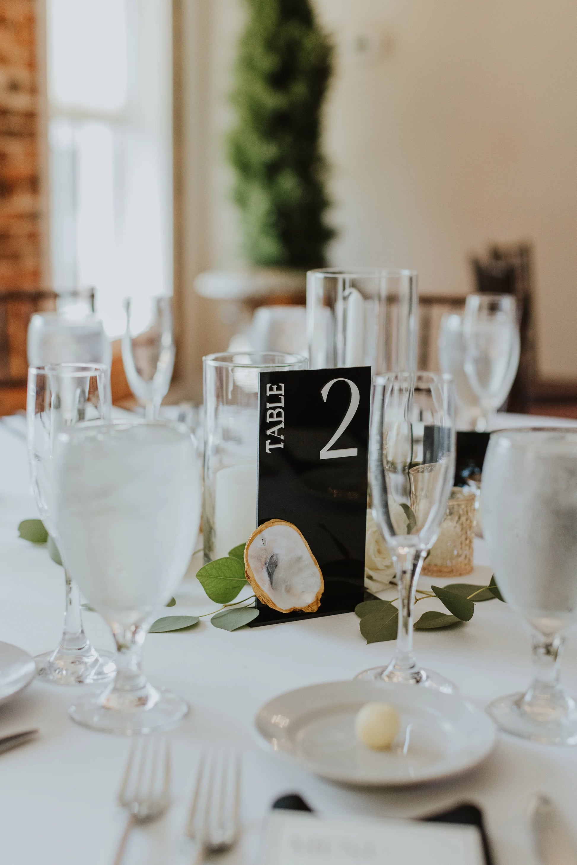 Elegant Black & Gold Oyster Shell Table Number Signs (Rental)
